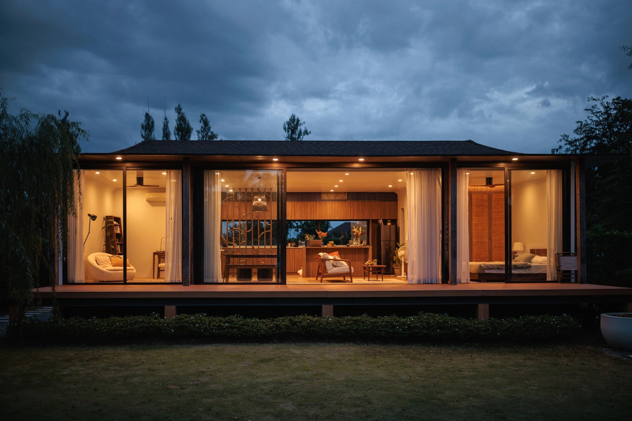 Modern residential home exterior at dusk